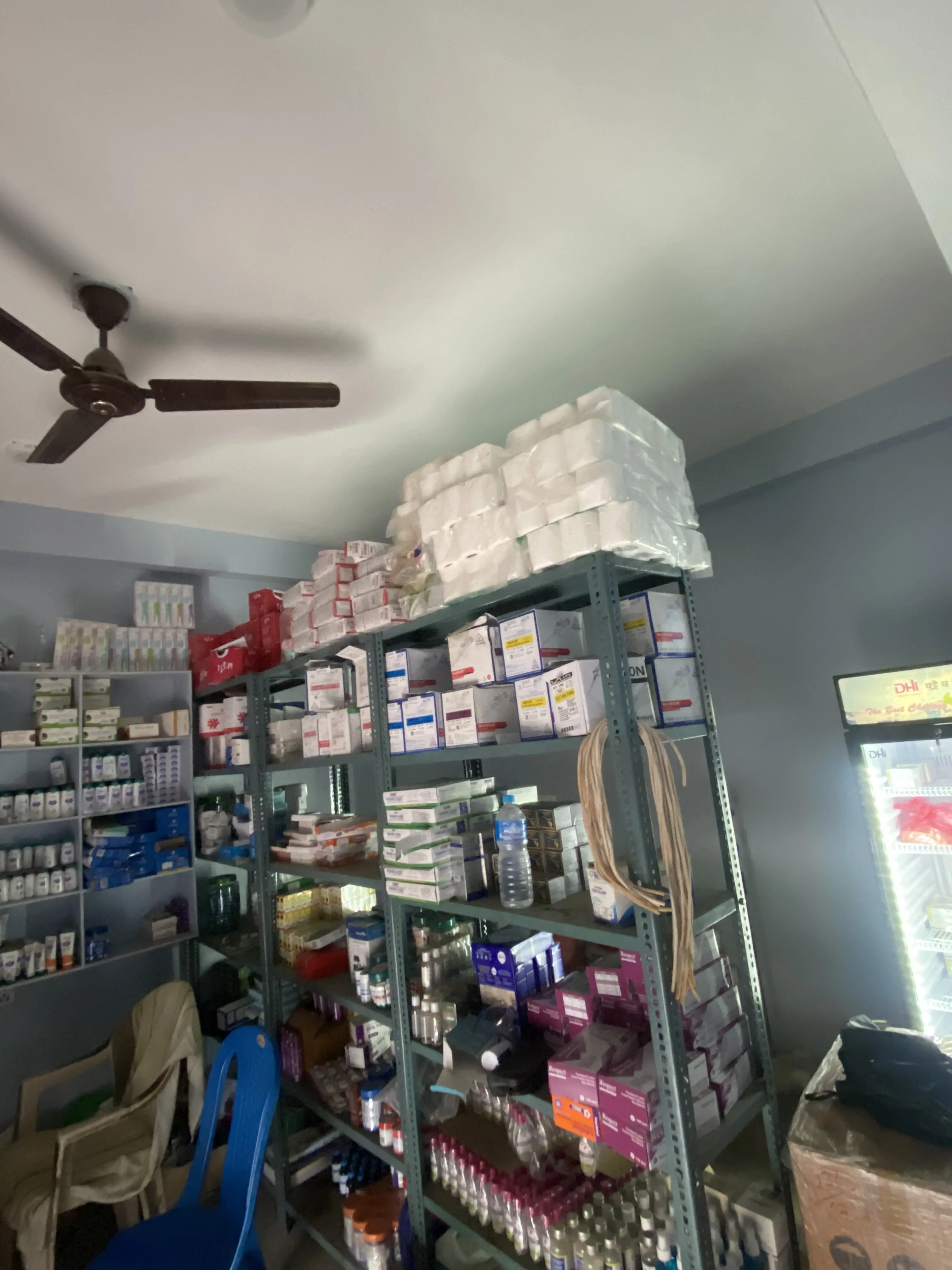 A clean clinical room equipped with a patient bed and medical monitoring equipment